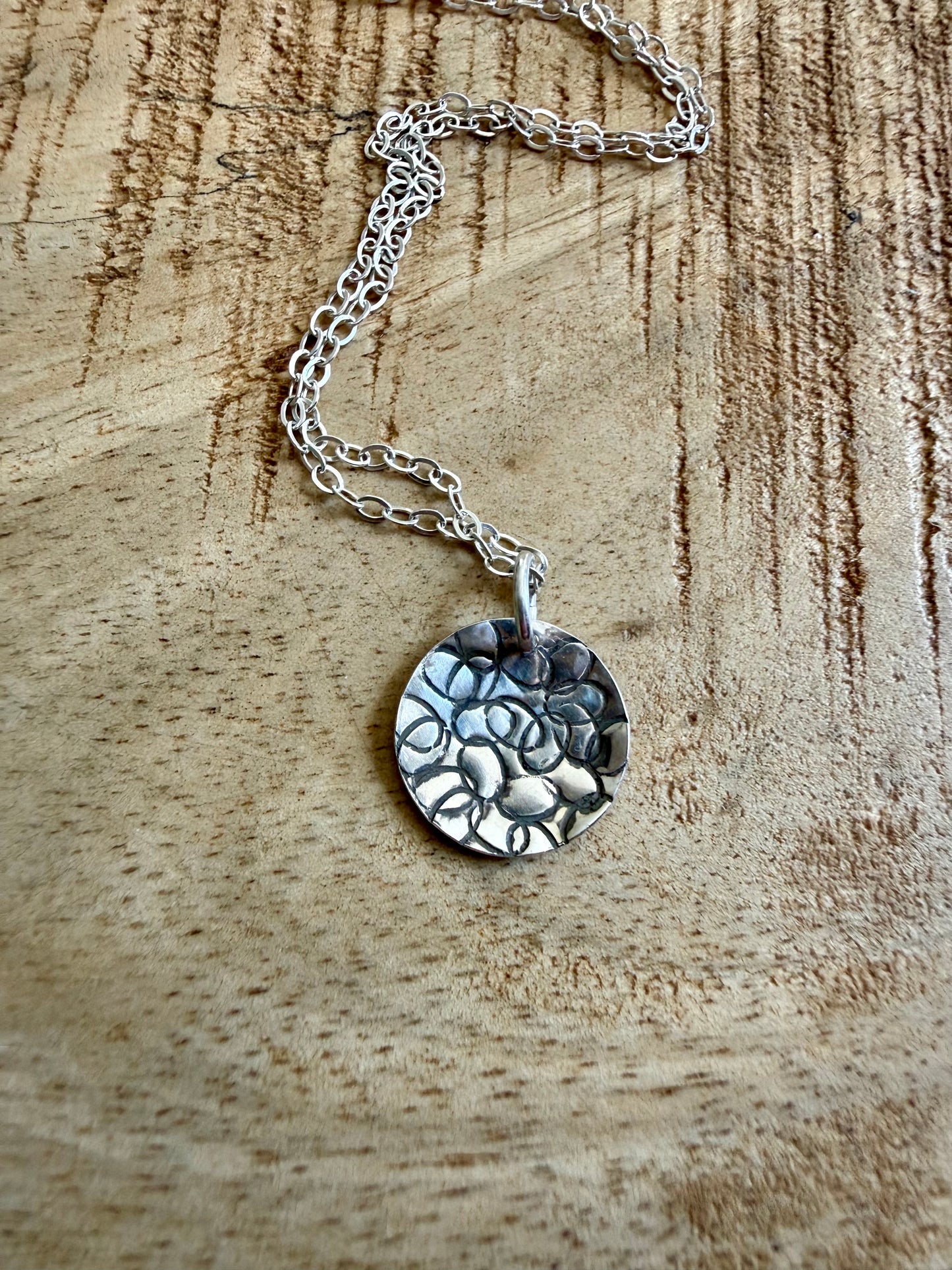 Circle with Dots Design Necklace in Sterling Silver