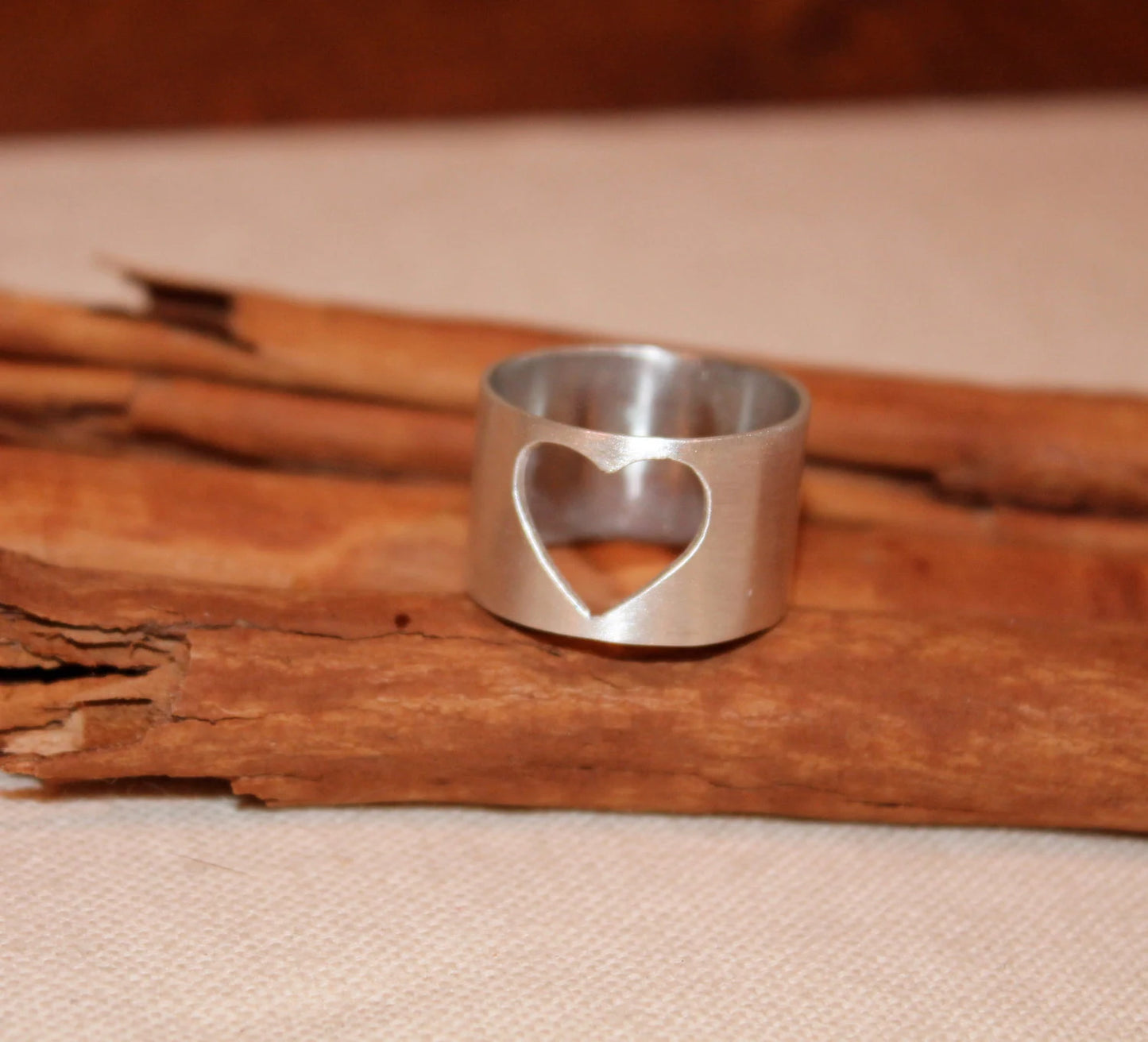 Wide Band with Heart Shaped Cut out in Silver