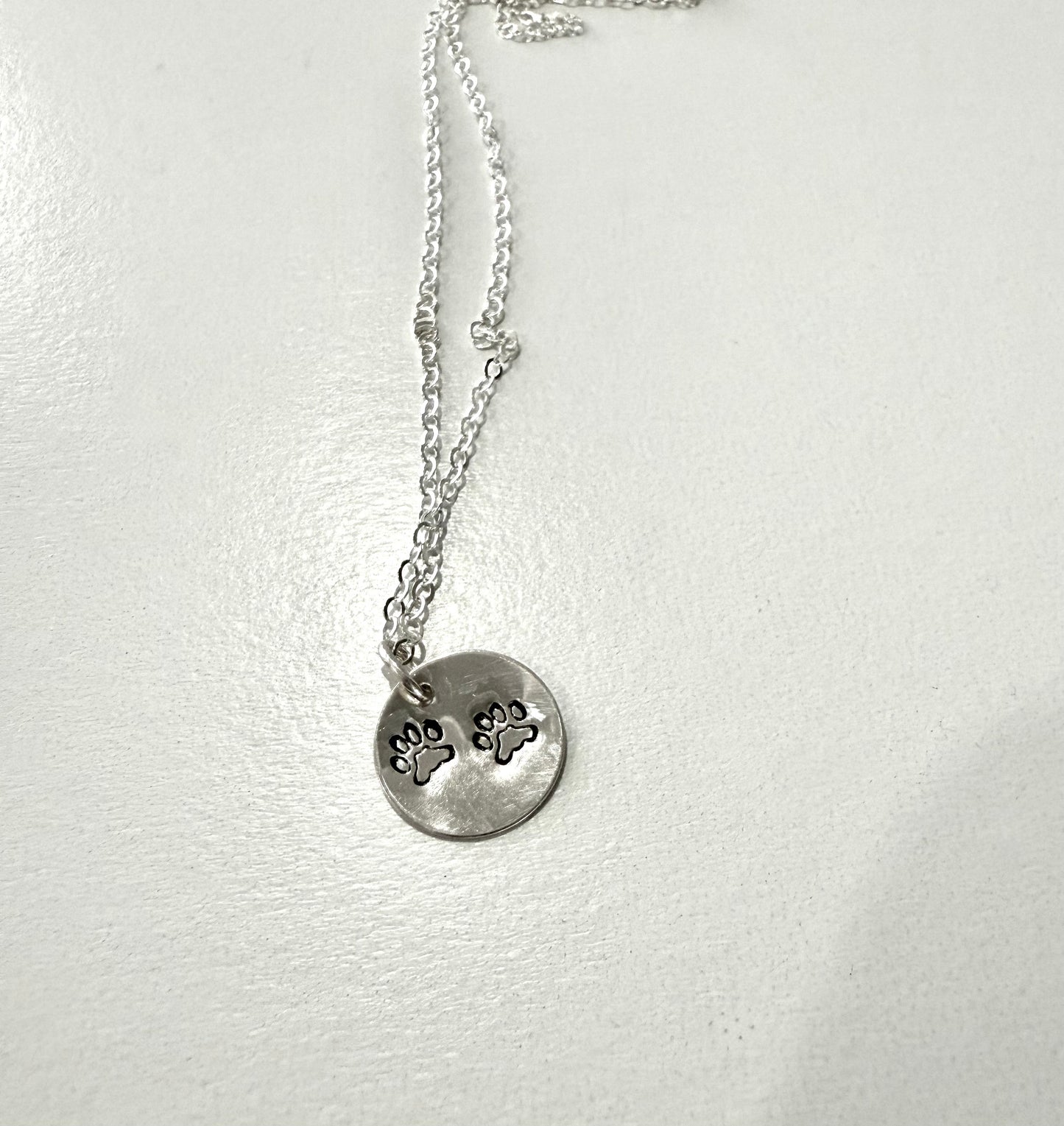 Paw Print Necklace with One Large Paw or Two Small Paws in Silver