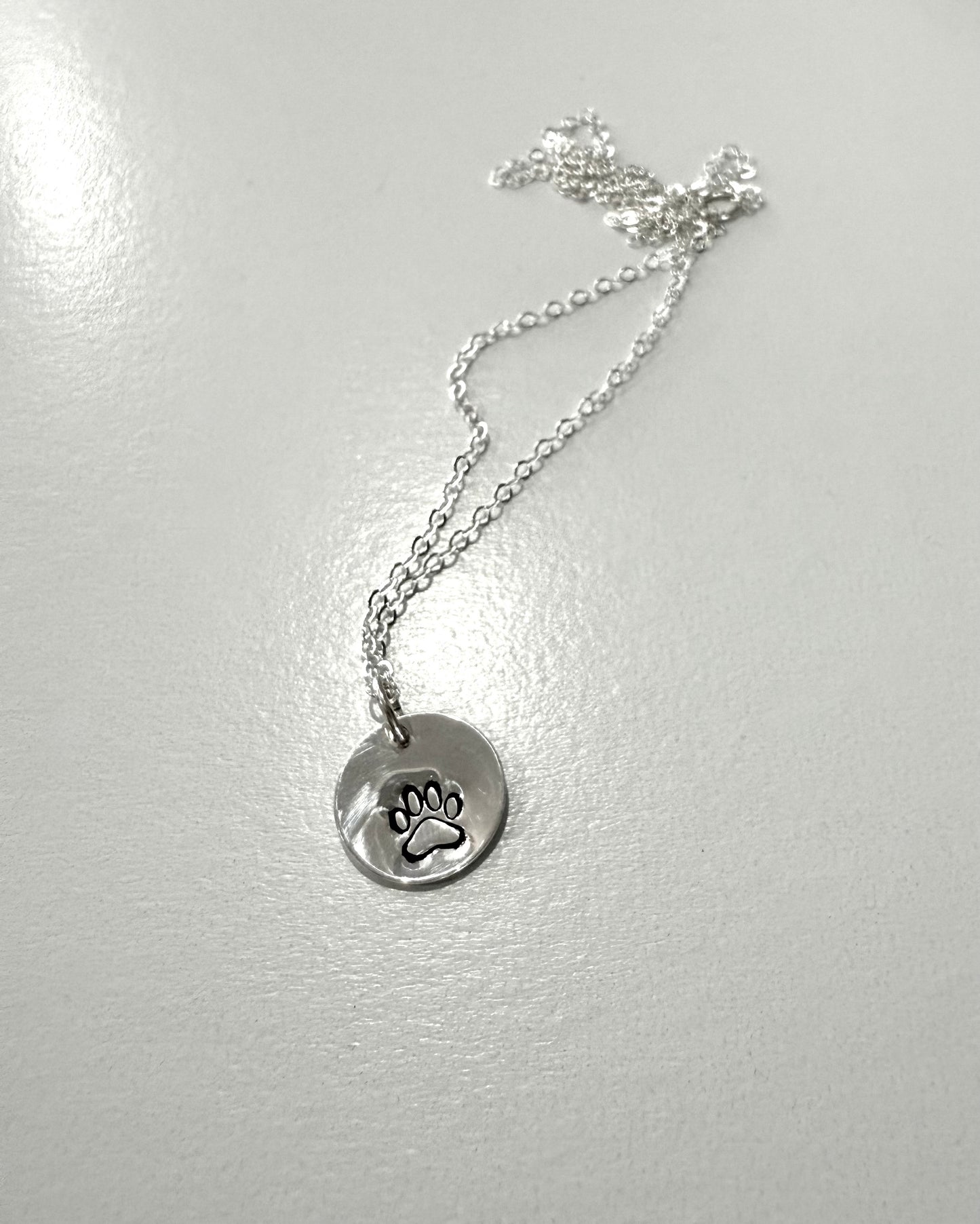 Paw Print Necklace with One Large Paw or Two Small Paws in Silver