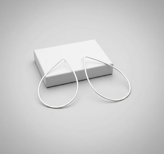 Large Silver Teardrop Post Earrings on box top to show post