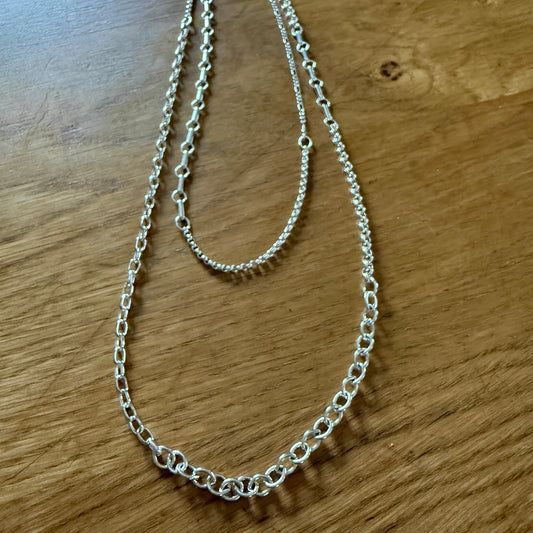 Mixed links silver chain that is 36" long