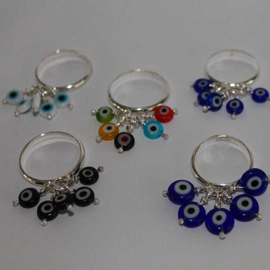 Evil Eyes Rings shown in all colors