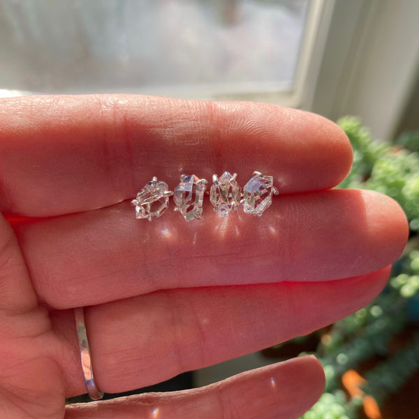 Herkimer Diamond Post Earrings, showing two different pairs on hand