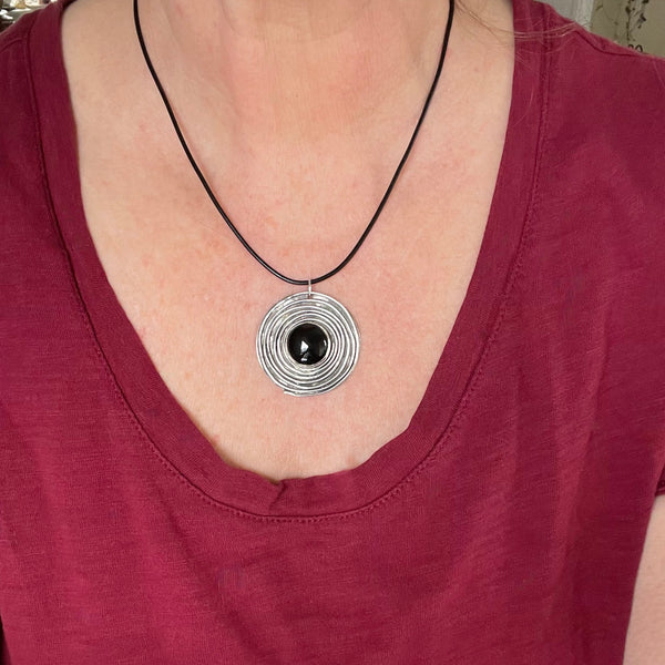 Large Onyx necklace shown on model's neck for size purposes