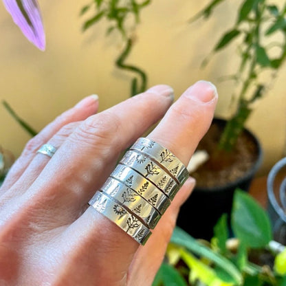multiple trees rings on finger