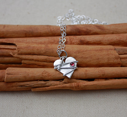 Small Mended Heart with Garnet