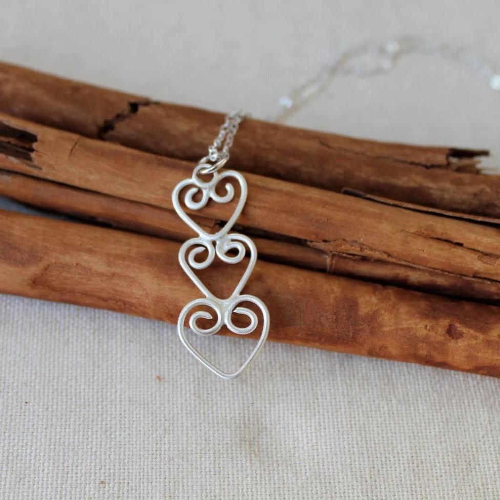 Three Hearts Connected Necklace in Silver