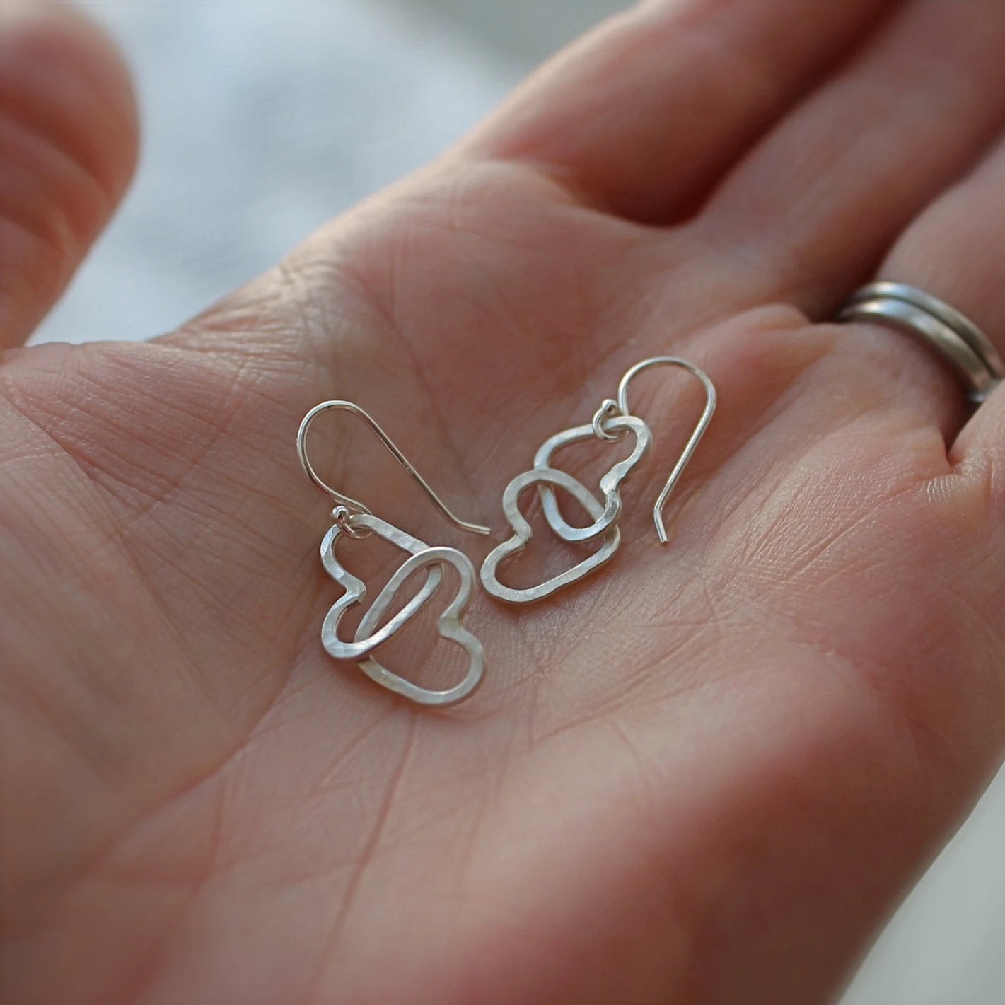 Hearts Linked Together Earrings in Silver