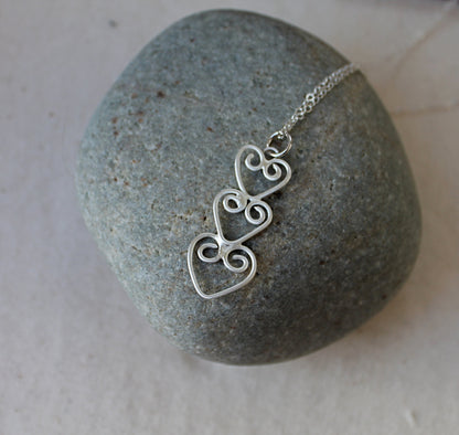 Three Hearts Connected Necklace in Silver
