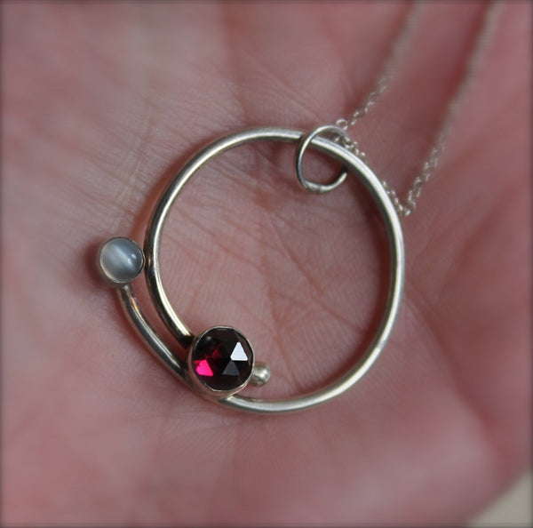 Circle with Rose Cut Garnet and Moonstone Pendant