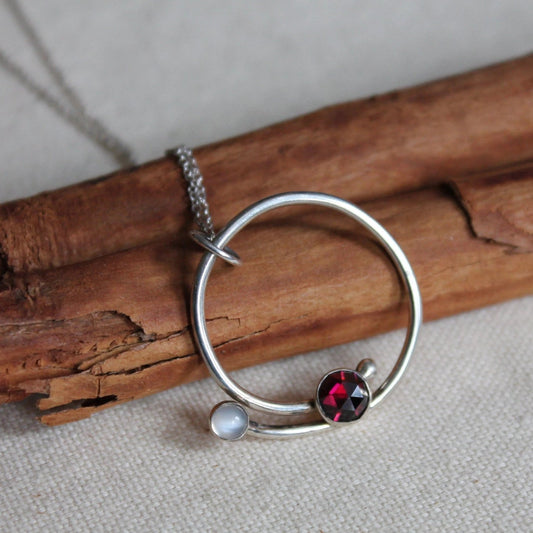 Circle with Rose Cut Garnet and Moonstone Pendant in Silver