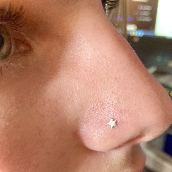 Star Nose Ring Shown in Nose