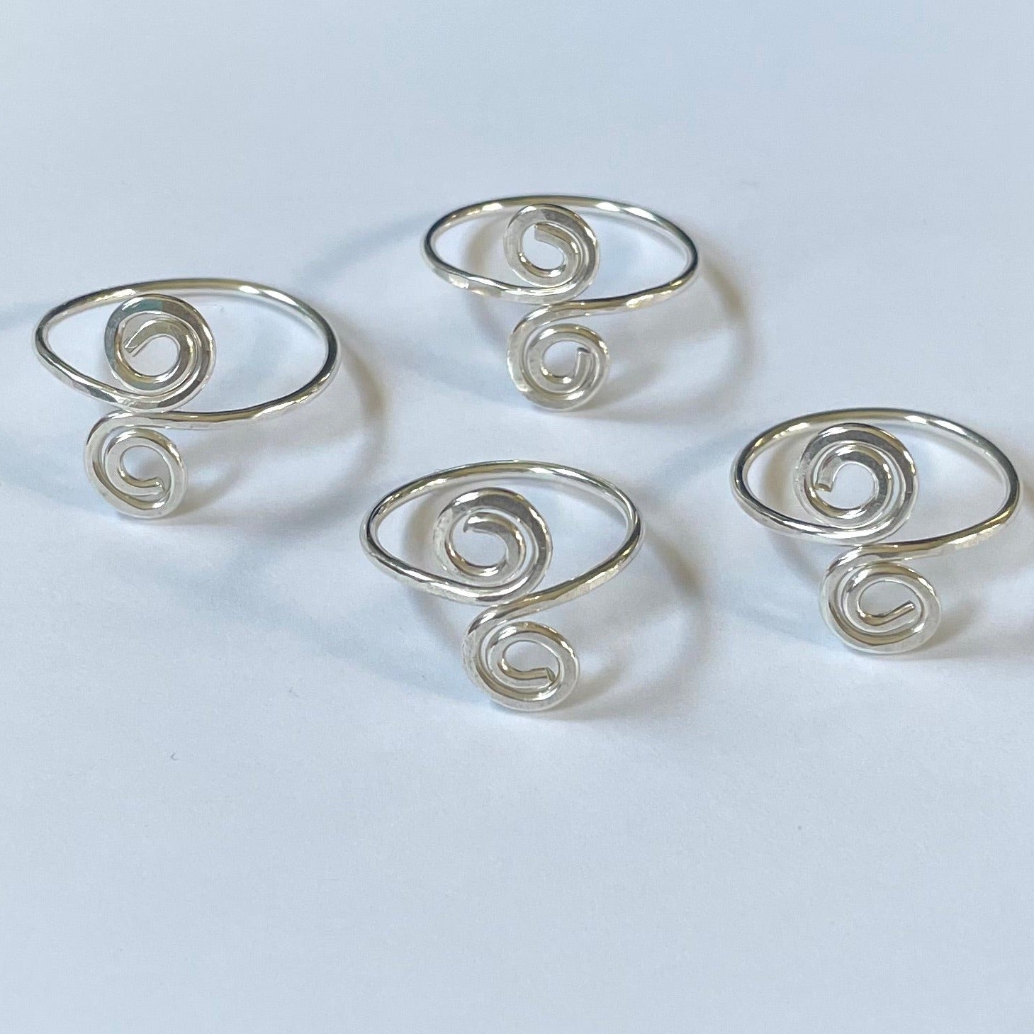 Double Swirl Rings with white background