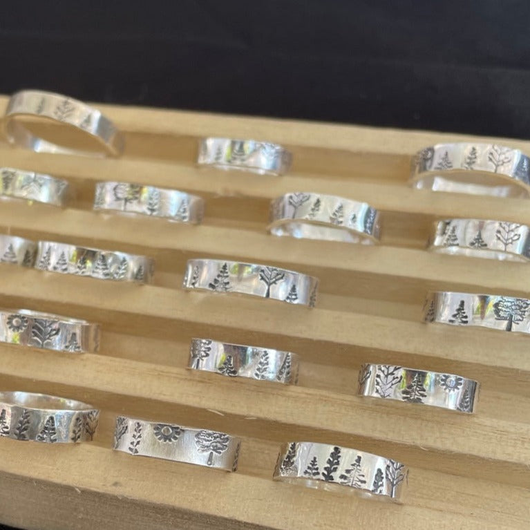 trees rings in ring holder display