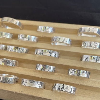 trees rings in ring holder display